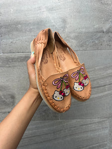 cherry hello kitty tan