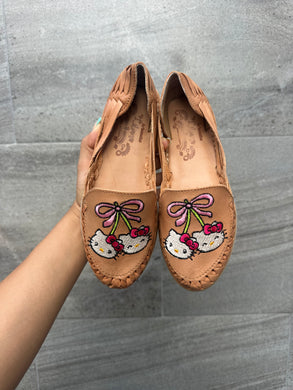 cherry hello kitty tan