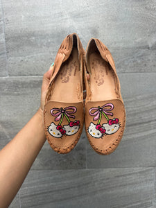cherry hello kitty tan