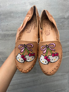 cherry hello kitty tan